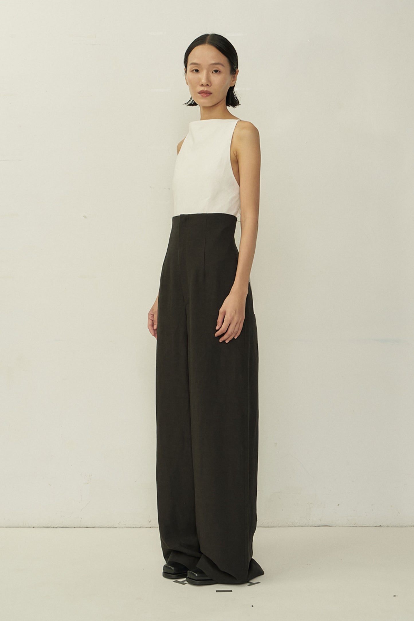 BLACK ZIP HIGH-WAIST WIDE TROUSERS