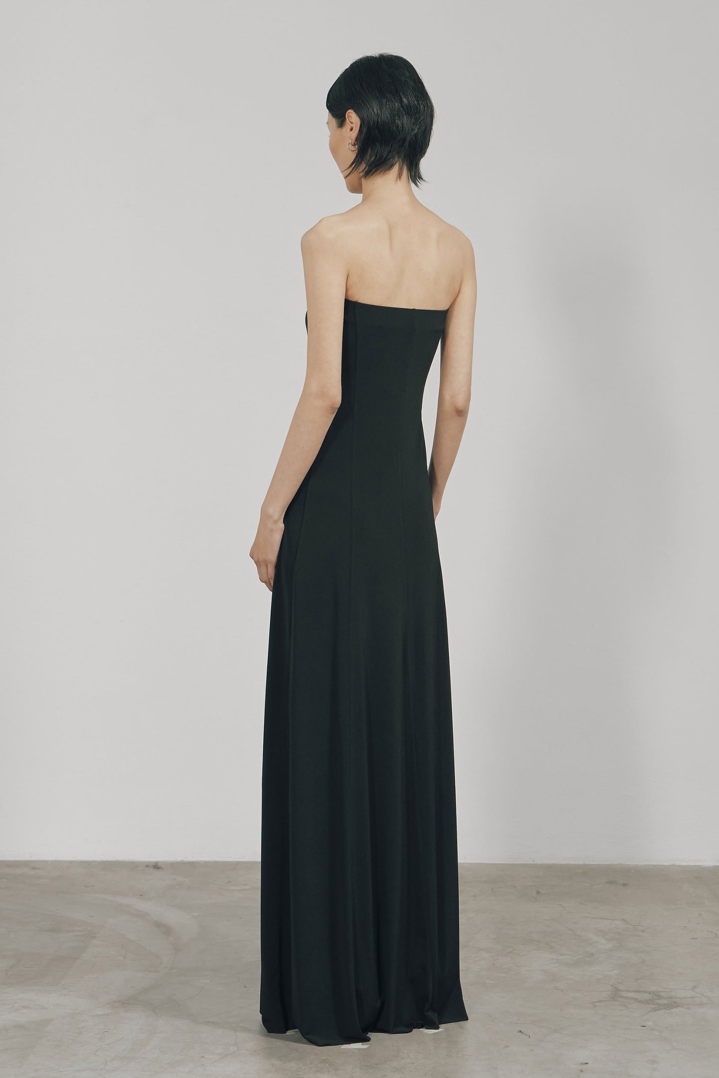 BLACK SKINNY FLARED TUBE MAXI DRESS
