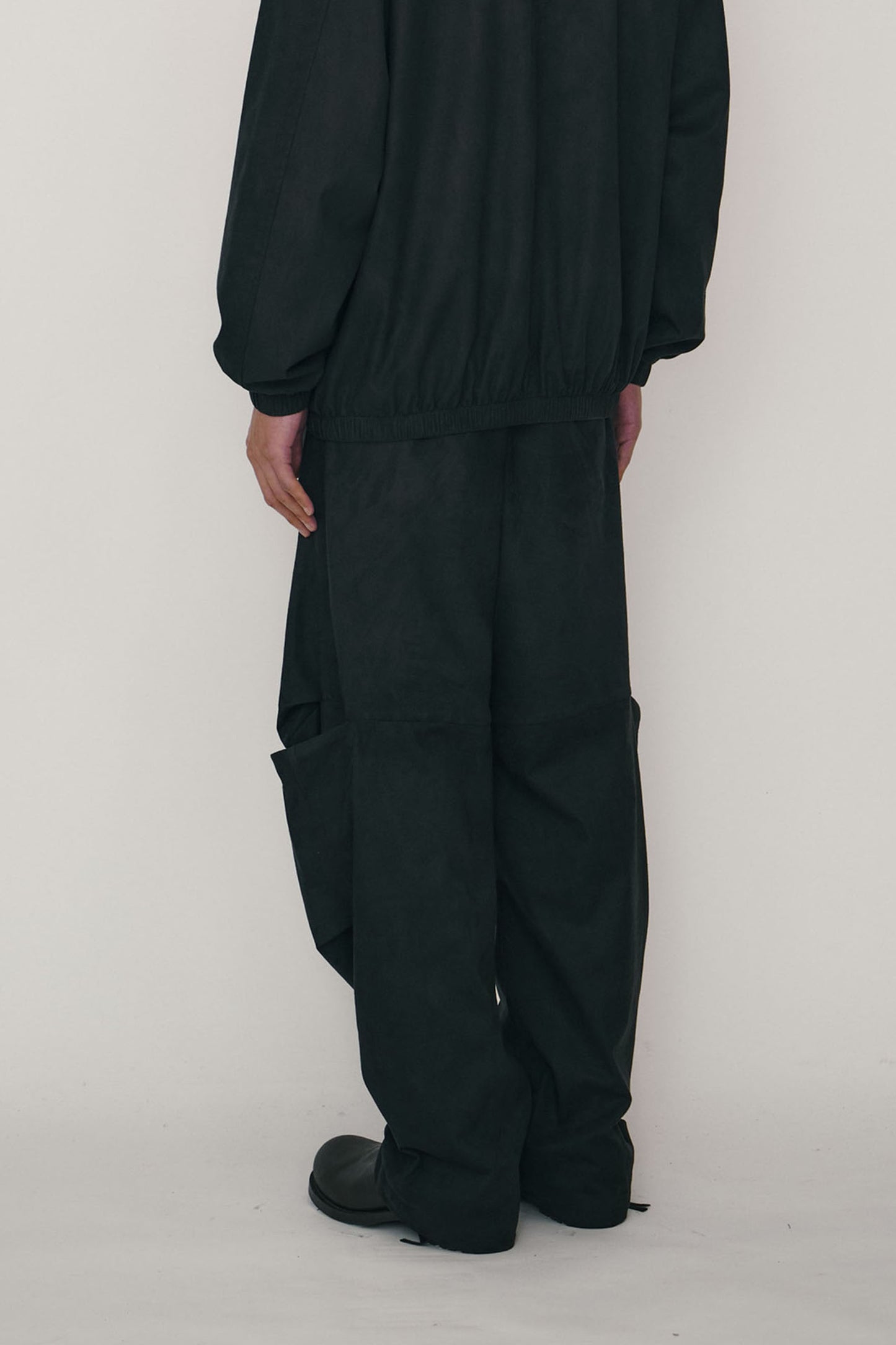 BLACK FAUX-SUEDE TUCK TROUSERS (MADE TO ORDER)