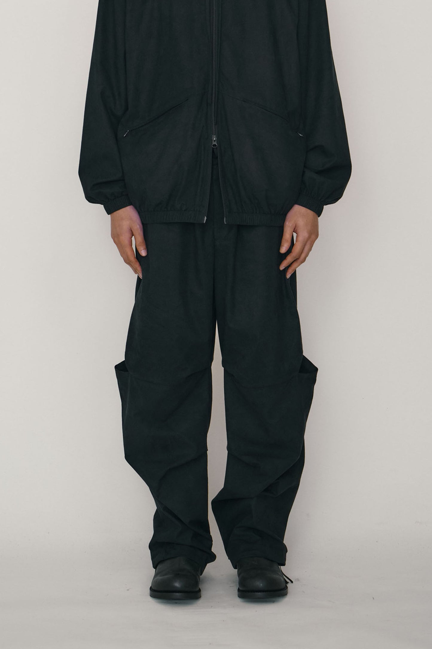 BLACK FAUX-SUEDE TUCK TROUSERS (MADE TO ORDER)